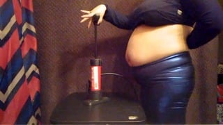 Big Bike Pump Belly Inflation in Shiny Pants