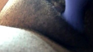Ebony hairy pussy plays with self