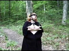 BBW has hard bondage in the forest.