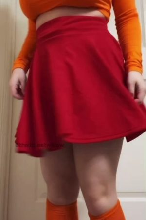 Serving orange delight, with bold BBW curves framed in the doorway. 💦 Who dares to handle this luscious hourglass challenge