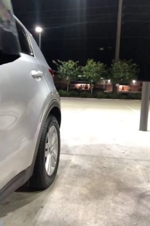This curvaceous goddess in a tight blue top, teasing by the car, just waiting for some public fun. Prepared to take a ride